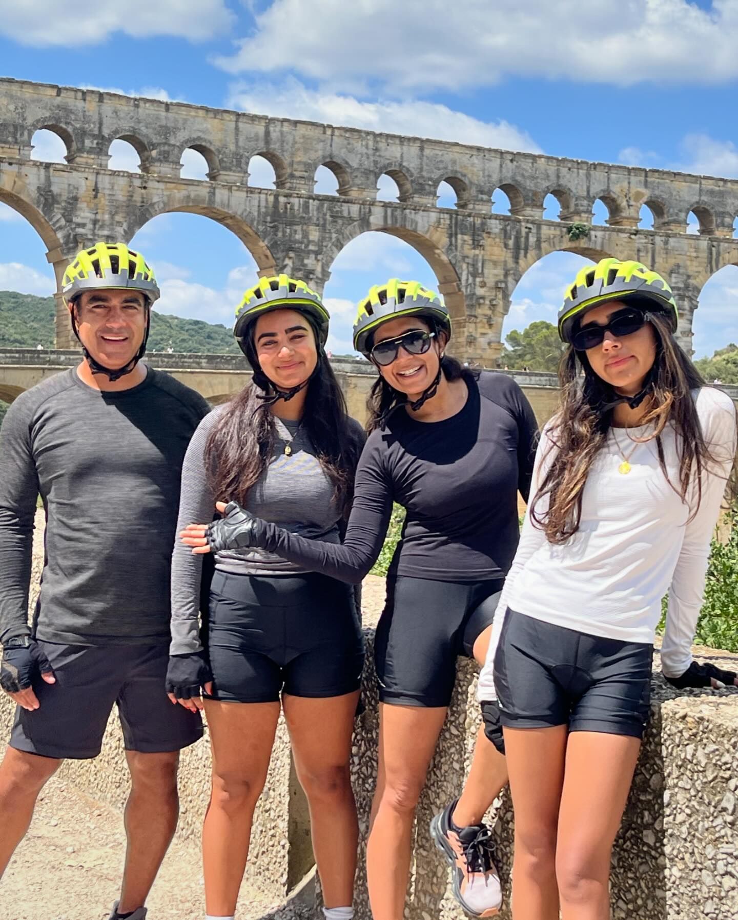 Group of cyclists by Pont du Gard in France